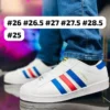 Tenis Adidas Superstar blancos con azul y detalle en rojo