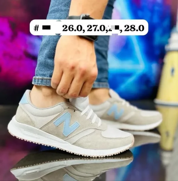 Tenis New Balance choclo gris con azul