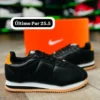 Tenis Nike Cortez negros con detalles en naranja calidad espejo