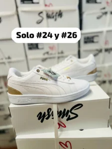 Tenis Puma Smash blancos con dorado