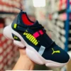 Tenis Puma Woman Sport negros con amarillo fluorecente