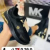 Tenis mk theo negros con dorados
