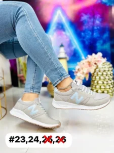 Tenis new balance gris con azul