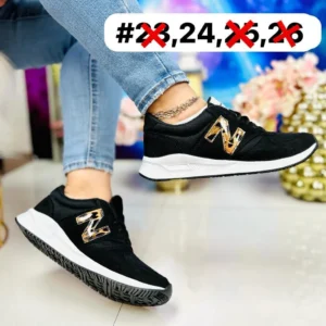 Tenis new balance negros animal print suela blanca