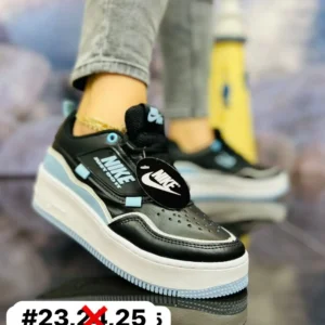 Tenis nike colors choclo negros con azul